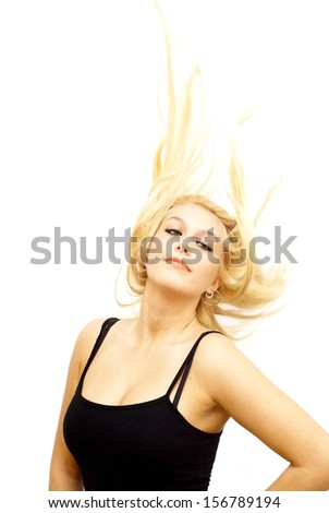 Wonderful blonde woman with her hair in the wind on white background