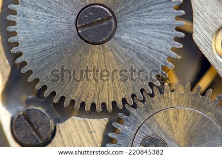 Background with metal cogwheels a clockwork. Conceptual photo for your successful business design. Macro.