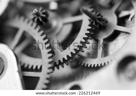 Black white background with metal cogwheels a clockwork. Conceptual photo for your successful business design. Macro.