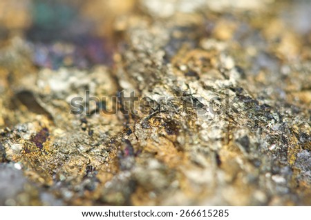 Chalcopyrite, It has the chemical formula (CuFeS2). Copper iron sulfide mineral. Macro. Beautiful fantastic background for successful projects.