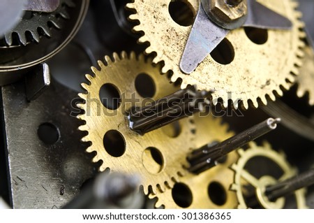 Metal Cogwheels Inside Old Clockwork to success concept for your technology design. Macro