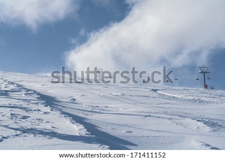 Mountain ski view with people - nature and sport background