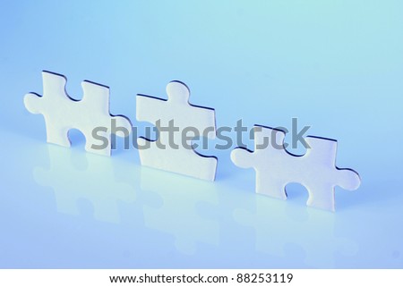 Three jigsaw puzzle pieces