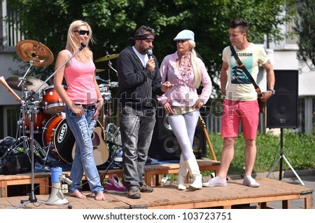 LUCENEC, MAY 28: Celebrities from Reality Show FARMA during BIKE PARTY HALIC 2012, on May 28, 2012 in Lucenec, Slovakia