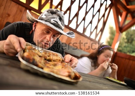 Down syndrome couple in barbecue party