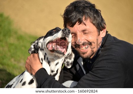 man with his pet dog