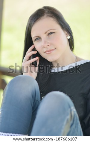 Close Up Of A Attractive Young Woman Speaking On Mobile Phone