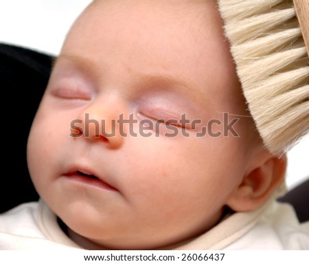 newborn  with comb over white