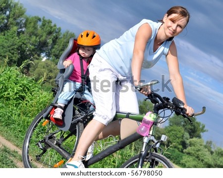 Mother and a daughter cycling