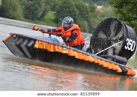 TRENCIN, SLOVAKIA - JULY 23: Mario Kohl from Germany participate in the European championship hovercraft Laugaritio July 23, 2011 in Trencin, Slovakia.