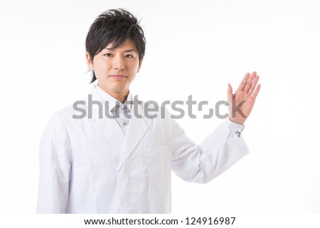 Young man in a white coat