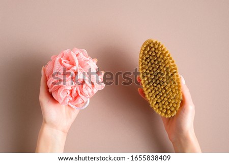 Similar – Image, Stock Photo Flatlay of woman rubbing cream in her legs in bed