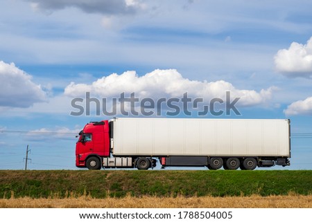 Similar – Image, Stock Photo White trailer on empty road between fields with vegetation