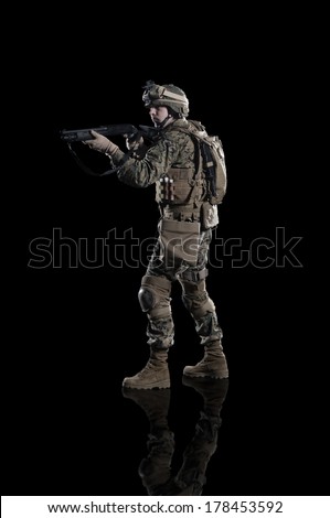 U.S. military marine. Studio shooting. with reflections. left turn view. isolated. With alpha channel - in my gallery.