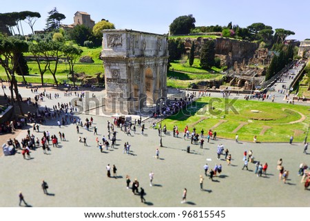 Arch of Constantine and Palatine Hill seen from Colosseum in the Roman Forum. Rome Italy. Tilt Shift photography.