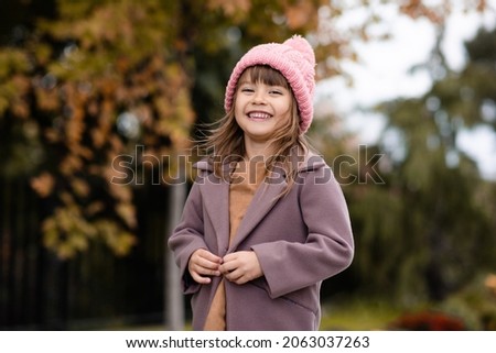 Similar – Image, Stock Photo child wearing a hat and glasses smiling at the camera