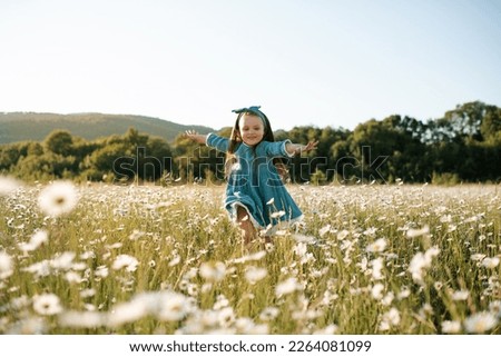 Similar – Image, Stock Photo Child picking spring flowers