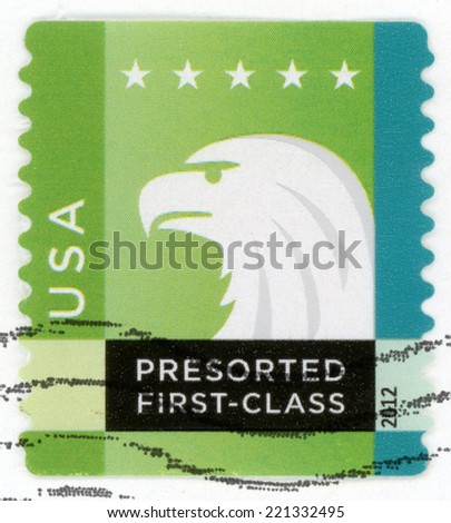 UNITED STATES OF AMERICA - CIRCA 2012: presorted first class mail post stamp printed in USA shows profile head of spectrum bald eagle and five stars, 25c green blue white, Scott 4588; circa 2012