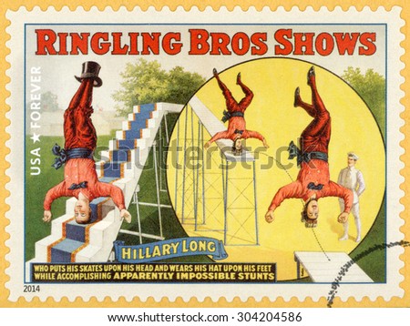 UNITED STATES - CIRCA 2014: forever stamp printed in USA shows Hillary Long; acrobat standing on head; riding on skates and wearing hat on feet; circus vintage posters; Ringling Bros shows; circa 2014