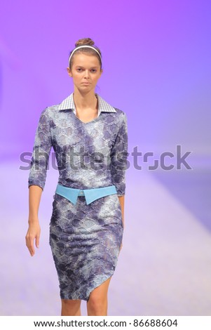 KYIV, UKRAINE - OCT. 14, 2011: Model walks the runway during Fashion Show by 