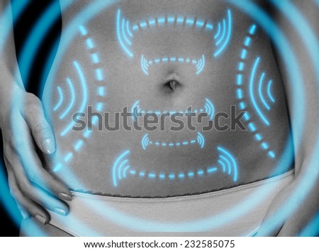 Close-up image of female belly with arrows, monochrome image. Fat loss and liposuction concept
