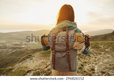 Image, Stock Photo Tourist with backpack walking among high rocks