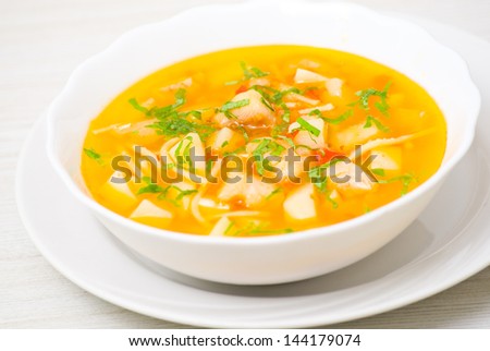 Fish soup with vegetables and pasta