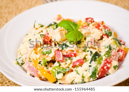 salad with chicken breast, ham, cheese, egg and vegetables