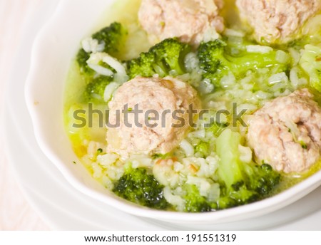 Soup with meatballs, rice and vegetables