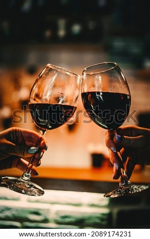 Similar – Image, Stock Photo Young woman enjoying wine near sea