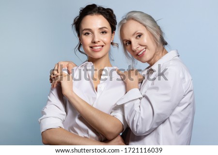 Similar – Image, Stock Photo Tender woman in white dress at seashore in summer