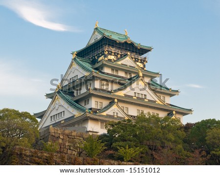 Osaka Castle with a warm golden glow before sunset