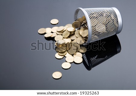 Tipped little basket and lot of money coins