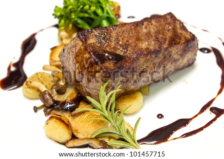 Beef steak with fried mushroom and gravy sauce