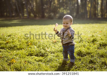 Child in autumn colors Imagine de stoc © 