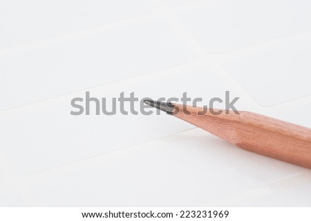 closeup pencil on sticky label background