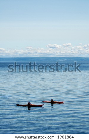 couple kayaking on the sea