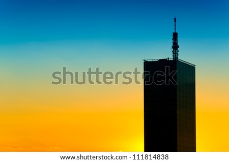 Modern building on the sunset