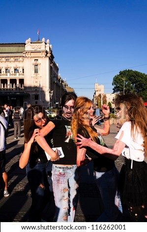 BELGRADE, SERBIA - OCT 20: Unidentified people at the first zombie festival and concert music held at Prince Michael suare on October 20, 2012 in Belgrade, Serbia