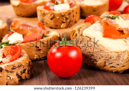 Selective focus on the cherry tomato