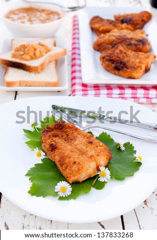 Selective focus on the piece of fried catfish