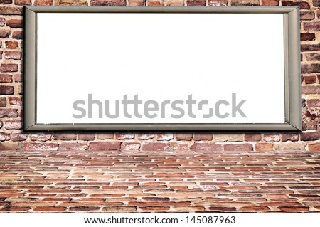 Big wall of the red bricks and blank billboard