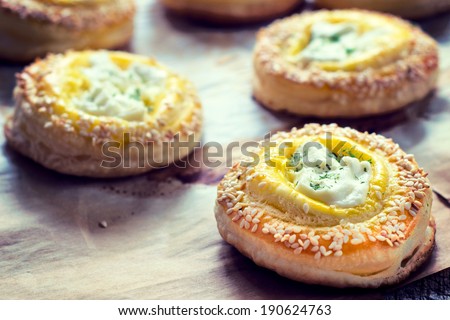 Golden color pastry stuffed with melting cheese.Selective focus on the front pastry
