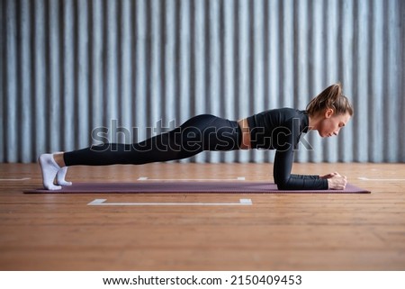 Similar – Image, Stock Photo Athlete woman doing leg stretch