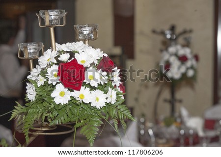 flowers decorations during indoor wedding ceremony