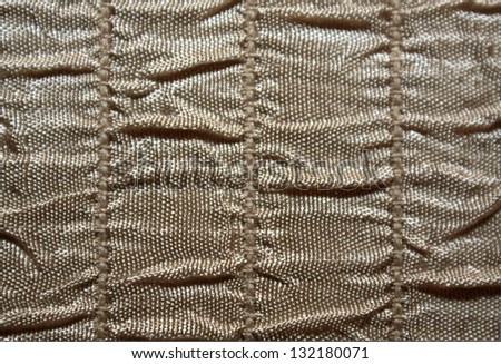 horizontal orientation close up of neutral brown colored ruched fabric with lots of copy space / Brown Horizontal Ruche