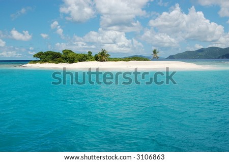 Remote island with pristine white sand surrounded by turquoise waters. Sandy Spit. Jost Van Dyke.  British Virgin Islands.