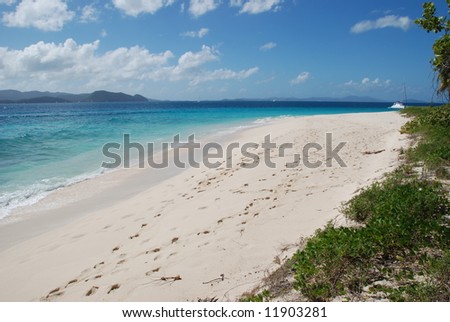 Broad beach on desert island.  Sandy Cay.  British Virgin Islands.
