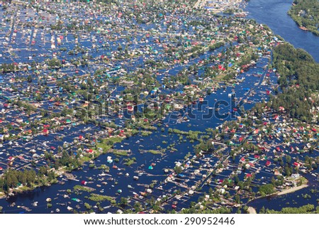 Ob River Flood June 2015 Aerial View of same houses in vicinity of Nizhnevartovsk, Tyumen region, Russia. Aerial view of the residential area of the suburb of Nizhnevartovsk during the flood of 2015.