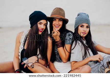 three beautiful girls on the beach